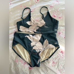 Albion 2 piece bathing suit. Lightly used. Size M and S